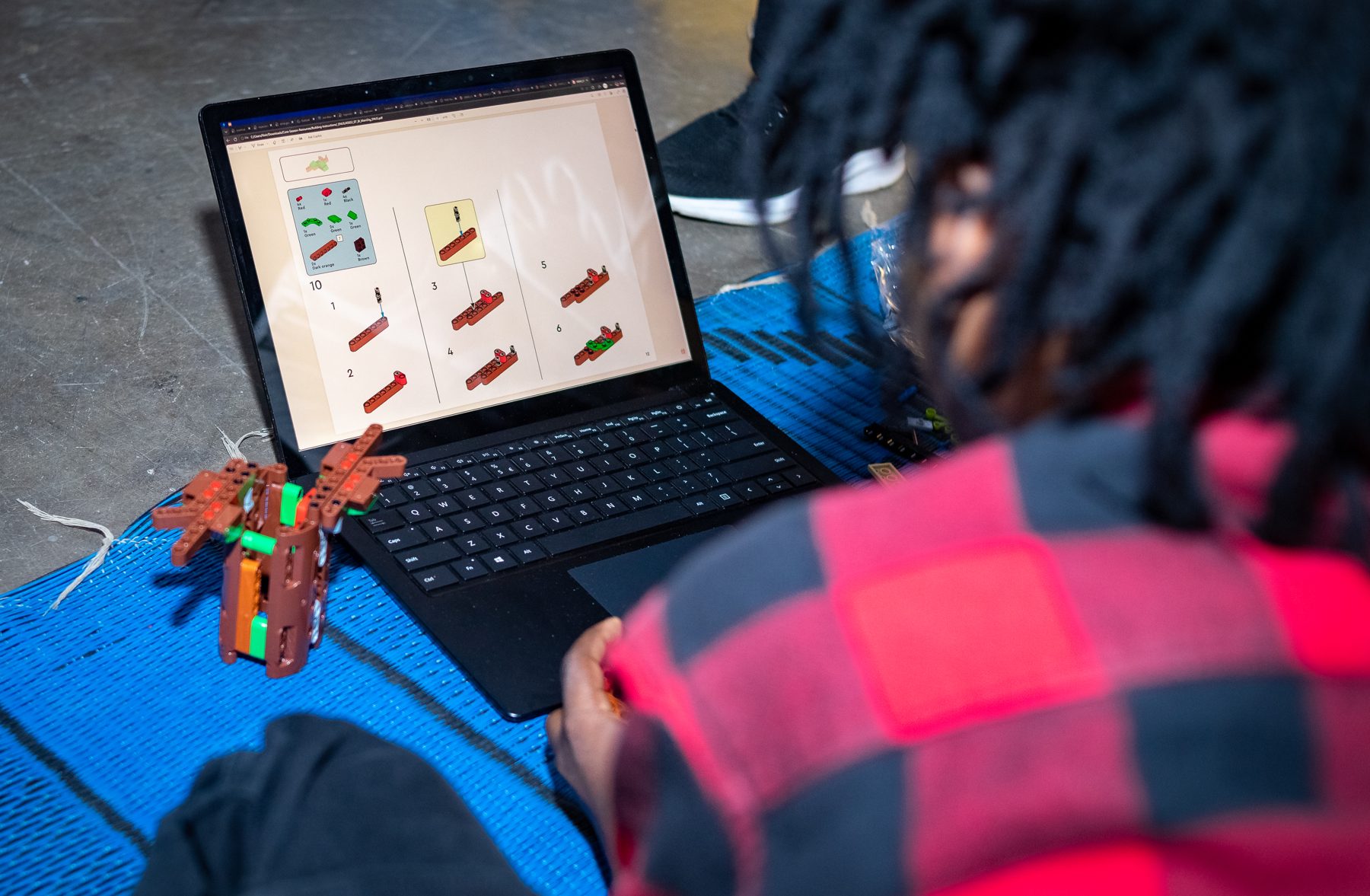 Young innovators building and testing a prototype